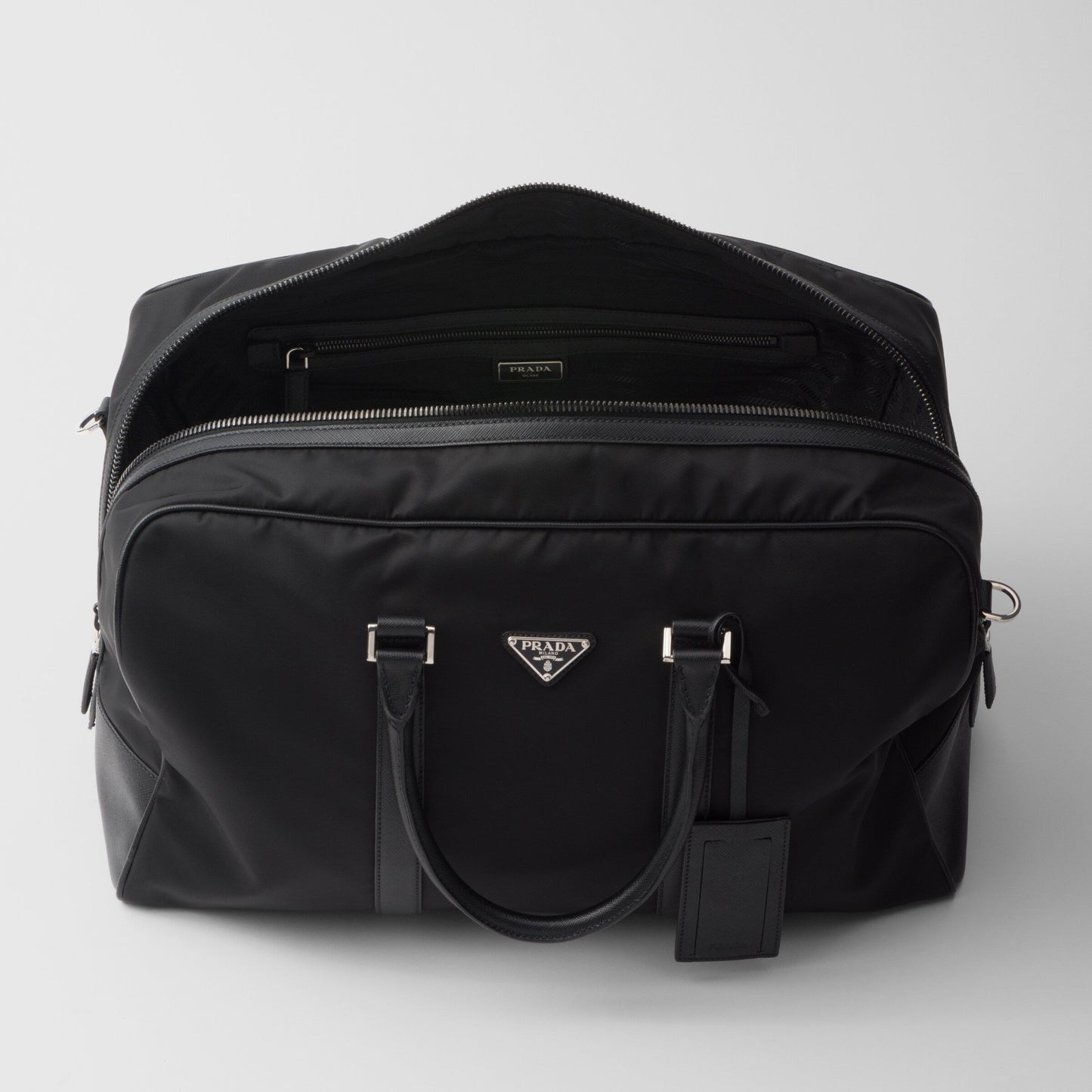 RE-NYLON AND SAFFIANO LEATHER DUFFEL BAG